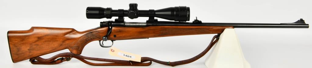 Winchester Model 70 Bolt Action Rifle .30-06: Up Next We Have a Nice Winchester Model 70 Bolt Action Rifle Chambered in .30-06, Jeweled Bolt, and Topped With a CenterPoint 4-16X40 AO Scope, Open Front Sight, Adjustible Rear, and Fitted With a Nic