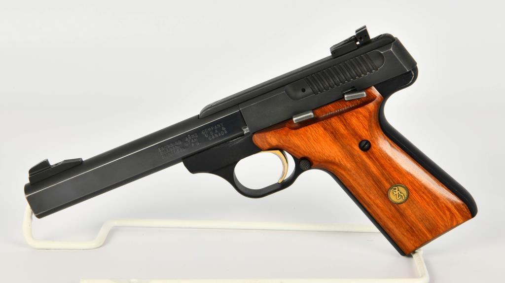 Browning Buckmark Semi Auto Pistol .22 LR: Up for auction is a Browning Buck Mark Semi Auto Pistol Chambered in .22 LR, It comes with One magazine, 5 1/2" barrel, Fixed Front Sight Adjustible Rear Sight, Gold Trigger, High Gloss Wood Grips Wit