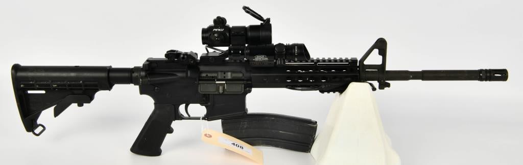Bushmaster XM15-E2S Semi Auto Rifle 6.8MM SPC: Up Next We have a Bushmaster XM15-E2S Semi Auto Rifle Chambered in 6.8mm SPC, Flat Top Upper, Comes WIth One 30 Round Magazine, Laser WIth Pressure Switch, Pinty Red/Green Dot Sight, A2 Front Sight Wi