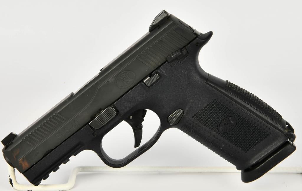 FNH FNS-40 Semi Auto Pistol .40 S&W: Up Next We Have a FNH FNS-40 Semi Auto Pistol Chambered in .40 S&W, It Comes With One 14 Round Magazine, and a 5" Barrel, Overall Appears in Great Condition. More From The Internet Below: Chambered in