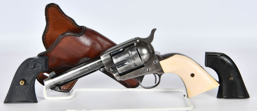 Colt Pre-War Single Action Army .32 WCF: Up Next We Have a Nice Colt Pre-War Single Action Army Chambered in .32 WCF, Serial # 324427 Dates to 1912. 4 5/8" Barrel, Matching Numbers, and Comes in a Leather Holster, and With Two Extra Sets of 