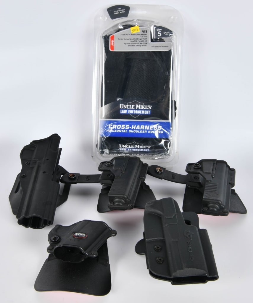 6 Various Style Polymer Holsters: Some are Fobus Holsters & Some Are Uncle Mikes , Various Size Black Color 1 Is a Cross Harness Nylon Holster For Berretta 92s