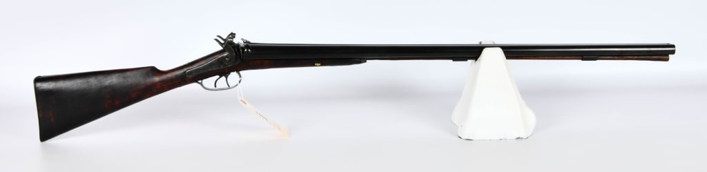 Antique English SXS Percussion Hammer Shotgun 12: Up Next We Have an Antique English Side by Side Percussion Hammer Shotgun Chambered in 12 Gauge, 32" Solid Rib Barrels, Double Triggers, Comes With Ramrod and Appears in Good Old Condition, Only Flaw 