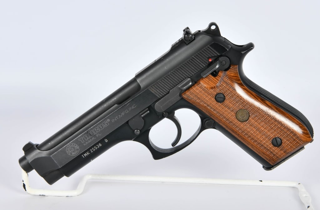 Taurus PT 99 AF 9MM Semi Auto Pistol: Up Next We Have a Taurus PT 99 AF Semi Auto Pistol Chambered in 9MM and Comes One Magazine, Factory Wood Grips, Appears in Overall Great Pre-owned Condition.