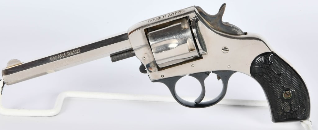 Harrington & Richardson The American DA Revolver: Up Next is an Old Harrington & Richardson The American Double Action Revolver Chambered in .32 S&W Caliber, 4 1/2" Octagon Barrel, Plastic Grips and Smooth Trigger.
