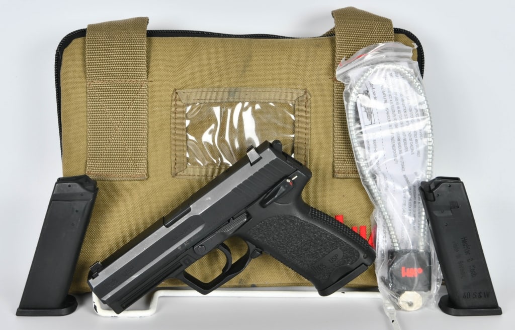 Heckler & Koch HK USP .40 Cal Semi Auto Pistol: Up for your bidding pleasure is an awesome HK USP Full size Pistol Chambered in .40 S&W. This gun Appears in Great pre-owned condition and comes with Three 13 Round Magazines, and in The Factory Tacti