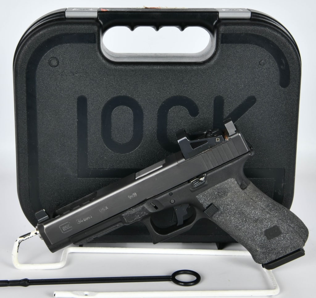 Glock 34 Gen 4 Long Slide Semi Auto Pistol 9MM: Up Next We Have a Glock 34 Gen 4 Long Slide Semi Auto Pistol Chambered in 9MM It Comes in The Factory Hardcase With One Magazines, Grip Tape, and Topped With an RMS Sight. Overall Appears in Good Pre-