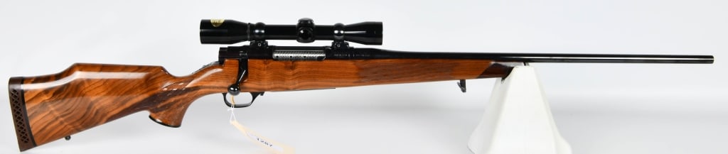 Nikko Model 7000 Golden Eagle High Grade .25-06: Up Next We Have a Nikko Model 7000 Golden Eagle High Grade Bolt Action Rifle Chambered in .25-06, 24" Barrel, Topped With a Burris 4X Scope, Jeweled Bolt, Beautiful High Gloss Checkered Monte Carlo St