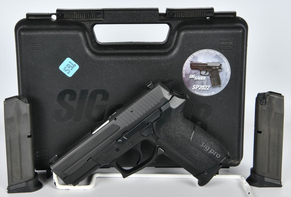 Sig Sauer SP2022 9MM Semi Auto Pistol: Up Next We Have a Sig Sauer SP2022 Semi Auto Pistol Chambered in 9MM, It Comes in the Original Factory Hardcase With Three Magazines. Appears In Great Pre-owned Condition. More From The Internet Below