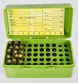 15 live rds and 23 casings 22 Hornet and container