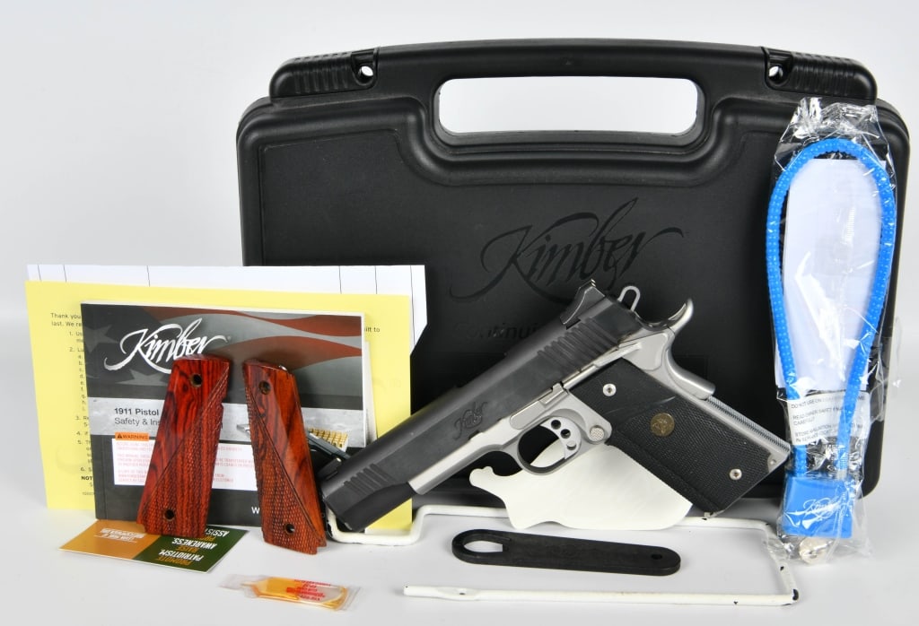Kimber Custom II Semi Auto Pistol .45 ACP: Up Next We Have a Kimber Custom II Semi Auto Pistol Chambered in .45 ACP, and Comes Dressed in Pachmayr Grips, and Comes With One Magazine, In Duotone, Overall Appears in Excellent Condition In The Fa