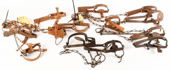 Approx 10 various Antique Traps Triumph and Vic