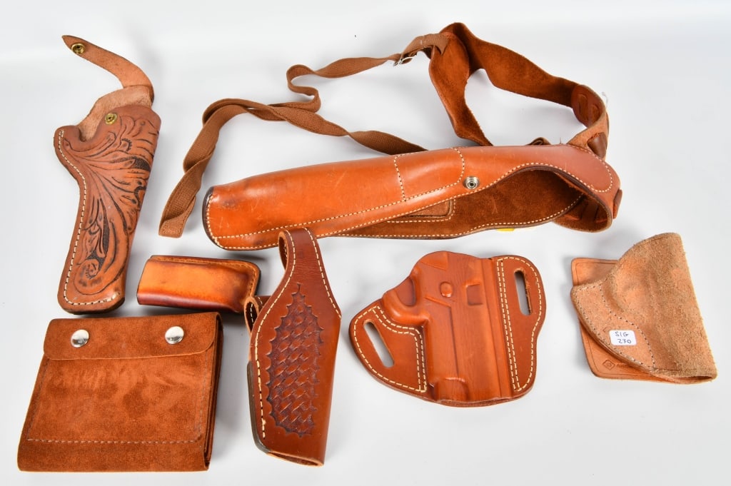 Leather Holsters various sizes & leather ammo pouc: this lot contains serveral handcrafted leather holsters in various sizes with one really nice leather ammo pouch: there is Bianchi #X 2100 PHANTOM .38/.357 LEft Hand for 6"large revolver this shoulder