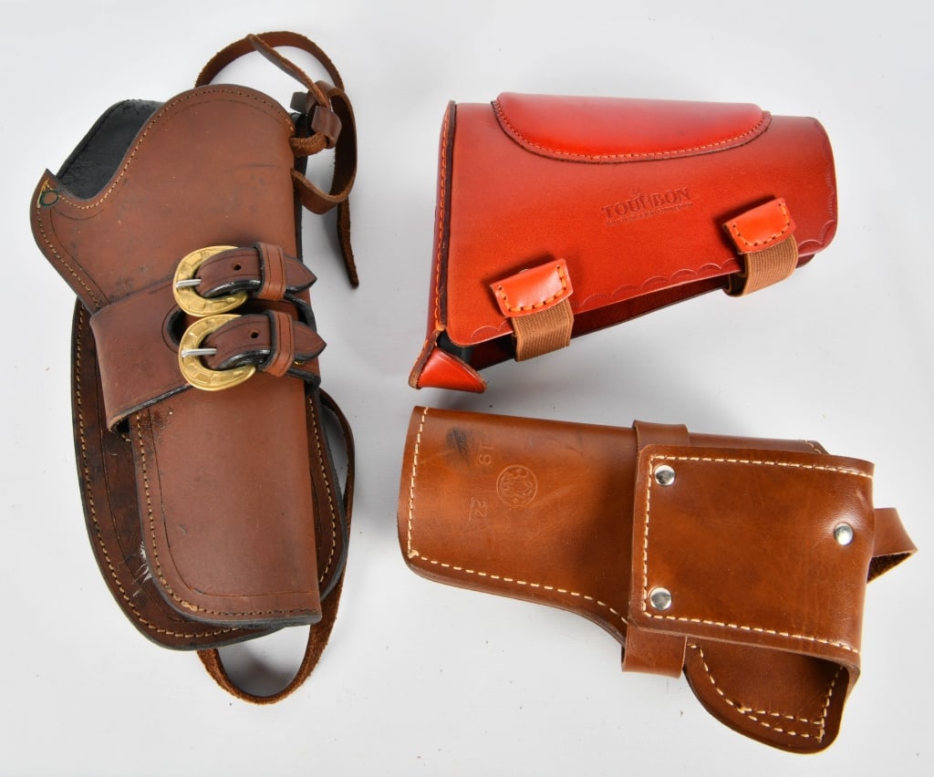 Leather Holsters & Tourbon stock cover: Leather Buttstock Extension Slip On Recoil Pad in like new condtion, with elestic snap and cheek rest. Heavy Duty unmarked super nice leather crafted Western double loop Holster with horshoe looking b