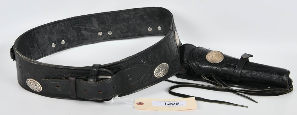 Unmarked Hand Tooled Leather Belt & Holster: Black Leather Hand Tooled, Approx Size 42" Waist Has Adjustments Holster Barrel Length Is 6" Long , Appears In Overall Good Condition