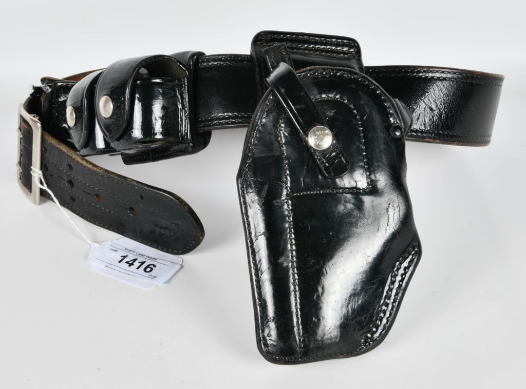 A.E Nelson Leather Duty Holster & Belt Combo: Has Dual Speed Loader Pouch Holster , Left Handed Black Leather Holster Belt Measures Approx 40" Has Adjustments Appears In Overall Good Pre-Owned Condition
