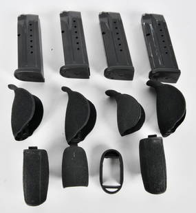 Smith & Wesson M&P9 Magazines and Backstraps: Here We Have a Lot of Four 15 Round Smith & Wesson M&P9 Magazines and Seven Interchangable Backstraps.