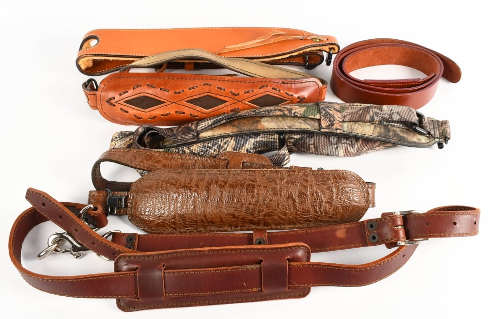 4 Various SHoulder Slings and a Leather Belt: 1- AA & E Leather Craft 1093 adjustable leather sling with padded shoulder, appears to be a faux aligator design 1- Camo print adjustable nylon sling with padded shoulder 1- adjustable Leather padded 
