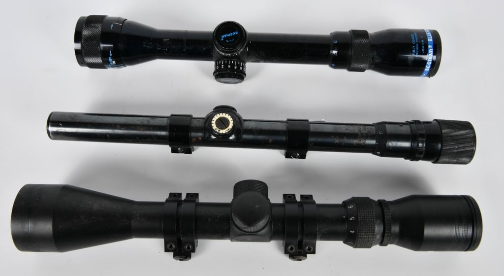 Deadringer 3-9x40, Beeman Blue ribbon,Weaver: lot contains three pre owned real nice Scopes; Dead Ringer 3-9X40 Black Matte Riflescope with Weaver rings mounted, optics are clear and clean with great cross hairs, then we have a real nice pre owne