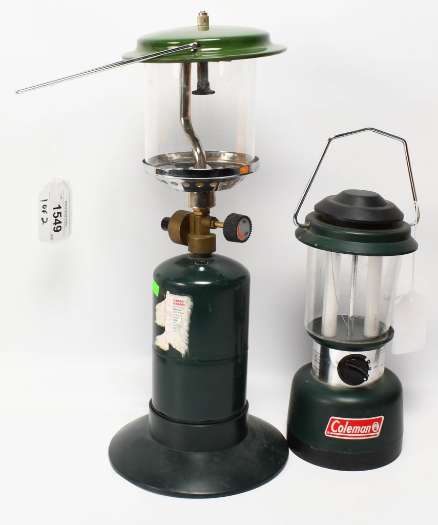 (2) Camping Lanters Coleman Battery operated and: unmarked proganie Lantern as seen in pictures both appear in real nice pre owned condition, The battery operated lantern is model 5344 in green and comes with fluorescent tubes (two 6" 4 watt tubes