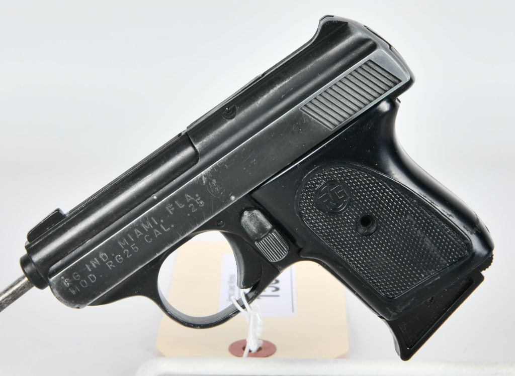 RG Industries RG25 Semi Auto .25 caliber Pistol: Up Next we have an RG25 Semi Automatic .25 caliber Pistol from RG Industries, the barrel measures approx 2.5" in length comes with synthetic grips with the "RG" emblem on the grips both sides, missing