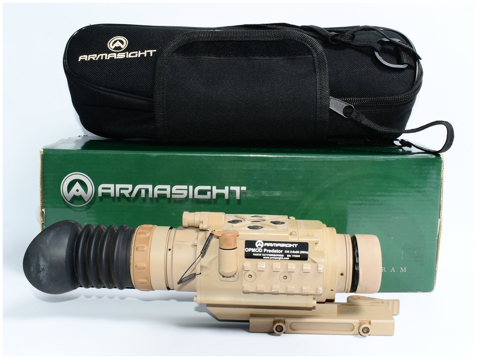 Armasight OPMOD Predator 336 2-8x25 (30Hz) Thermal Optical Device with Box and Case: A modern tactical optical device, identified as an Armasight OPMOD Predator 336 2-8x25 (30Hz), is presented with its original branded green box and black soft carrying case. The device features a dese