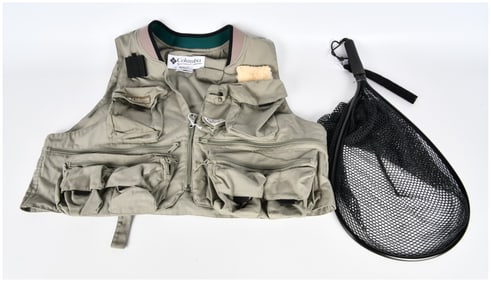 A Columbia PFG Men's Fishing Vest, Size Large, with a Landing Net