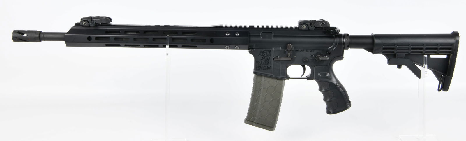 BEAR CREEK ARSENAL BCA15 Semi-Automatic Rifle in .450 BUSHMASTER Caliber: A BEAR CREEK ARSENAL MODEL: BCA15 semi-automatic rifle, constructed primarily from black-anodized aluminum and synthetic polymer materials, chambered in .450 BUSHMASTER Caliber. The receiver is marked