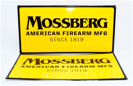 A Pair of Mossberg Advertising Signs with Four Boxes of Vintage Shotgun Shells