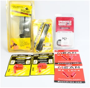 A Group of Six Firearm Accessories, including a Maglula M-16/AR-15 StripLULA Loader and a Butler