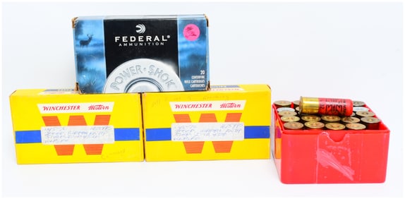 A Collection of 63 Rounds of Ammunition, 20 Empty .45-70 Brass Casings, and Three Vintage Ammunition