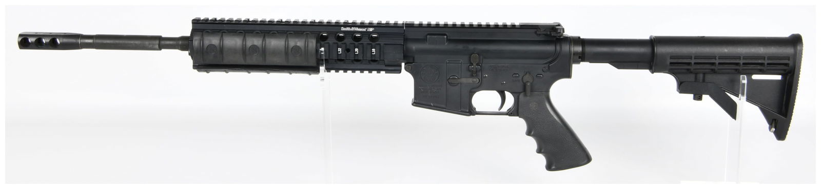 Smith & Wesson M&P15-T Semi-Automatic Rifle, NO MAGAZINE: A modern Smith & Wesson M&P15-T semi-automatic rifle, NO MAGAZINE. The rifle is primarily constructed of black-anodized aluminum and polymer components. It features an adjustable stock, a pistol grip,