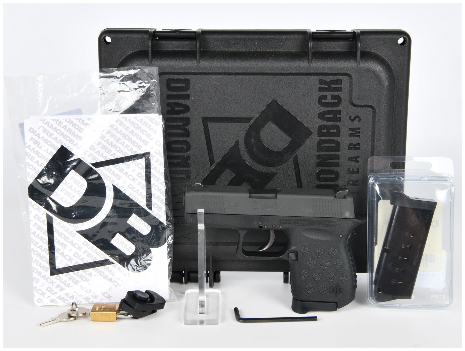 Diamondback Firearms DB9NS Semi-Automatic Pistol, 9x19mm: A modern Diamondback Firearms DB9NS semi-automatic pistol chambered in 9x19mm. The pistol features a black polymer frame and a black metal slide. Markings include "Diamondback Firearms Cocoa, FL", "DB