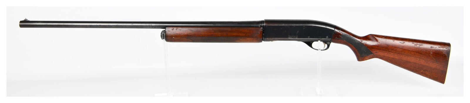 Remington Model 11-48 12 Gauge Semi-Automatic Shotgun, Serial Number 5202382: A Remington Model 11-48 semi-automatic shotgun, chambered in 12 gauge for 2 3/4 or shorter shells. The shotgun features a blued steel action and barrel, paired with dark stained wood for the buttstock