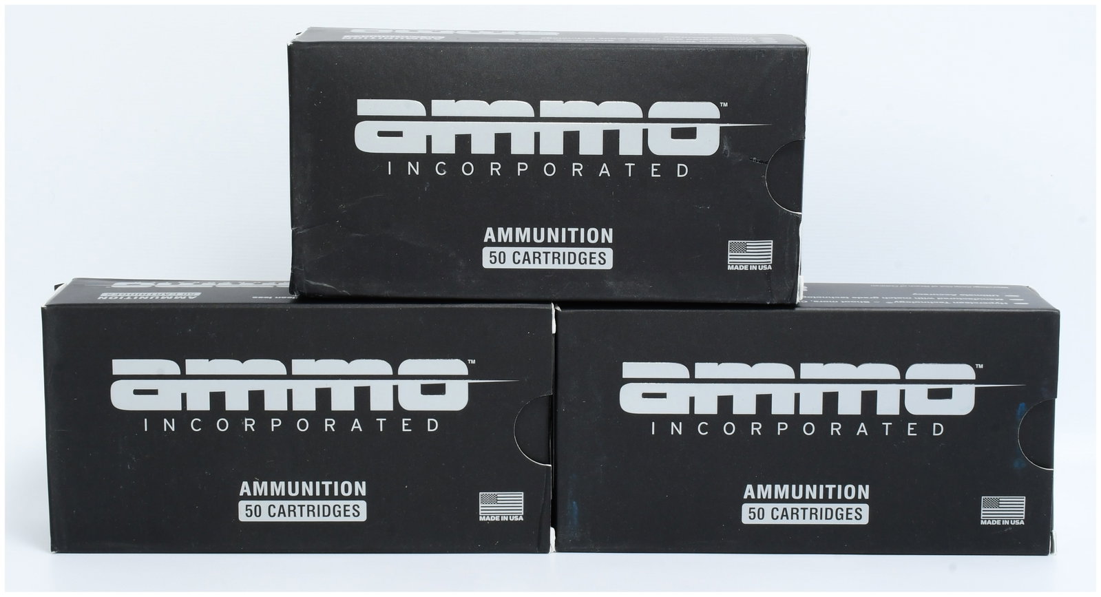 Ammo Inc. 44 Mag 240gr TMC Ammunition, 150 Rounds: A lot of Ammo Inc. 44 Mag 240gr TMC ammunition, comprising 150 rounds. The lot includes three modern, black cardboard boxes, each prominently marked with the "AMMO INCORPORATED" logo, "AMMUNITION," "5