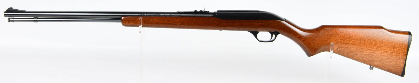 Marlin Model 60 Semi-Automatic .22LR Rifle: A Marlin Model 60 semi-automatic rifle chambered in .22 Long Rifle. The barrel is clearly marked "THE MARLIN FIREARMS CO. NORTH HAVEN, CT, U.S.A. MODEL 60 MICRO-GROOVE BARREL CAL. 22 L.R. ONLY." The r