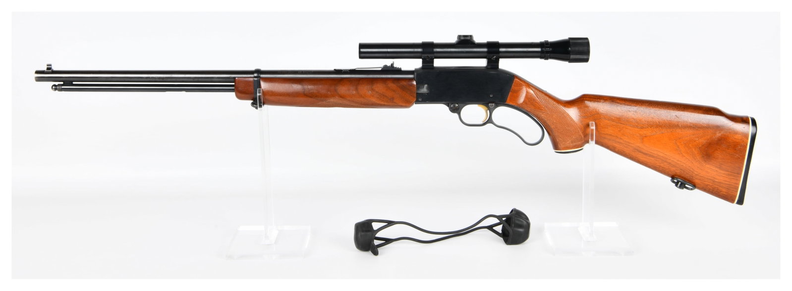 Mossberg Model 402 Palomino .22 S-L-LR Lever Action Rifle with Weaver D4 Scope: An O.F. Mossberg & Sons Inc. Model 402 Palomino lever-action rifle, chambered for .22 S-L-LR ammunition, manufactured in North Haven, Connecticut, U.S.A. The rifle features a blued metal finish on the