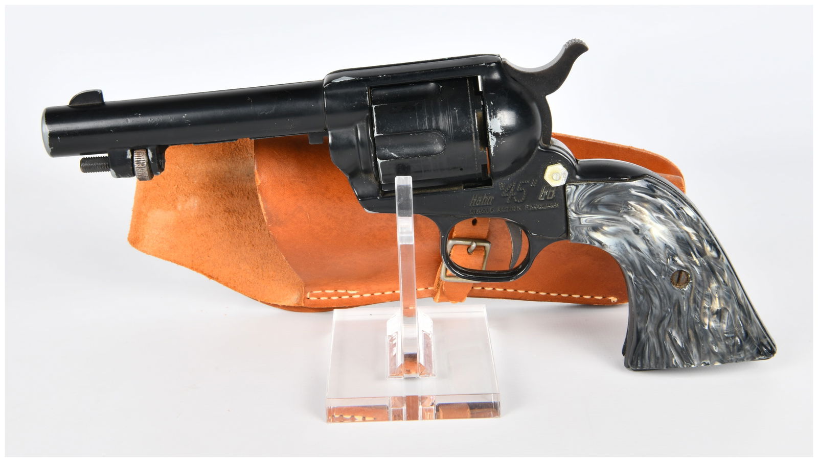 Hahn 45 BB Single Action Revolver with Holster: A Hahn 45 BB Single Action Revolver, manufactured by P.Y. Hahn Mfg. Co., Inc. of Fairport, New York. This Western-style single-action BB revolver features a black finish and two-piece marbled grey and