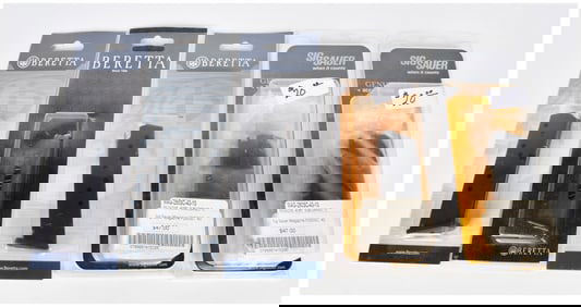 A Group of Five New, Sealed Beretta and Sig Sauer Pistol Magazines, including .380 ACP, .22LR, and