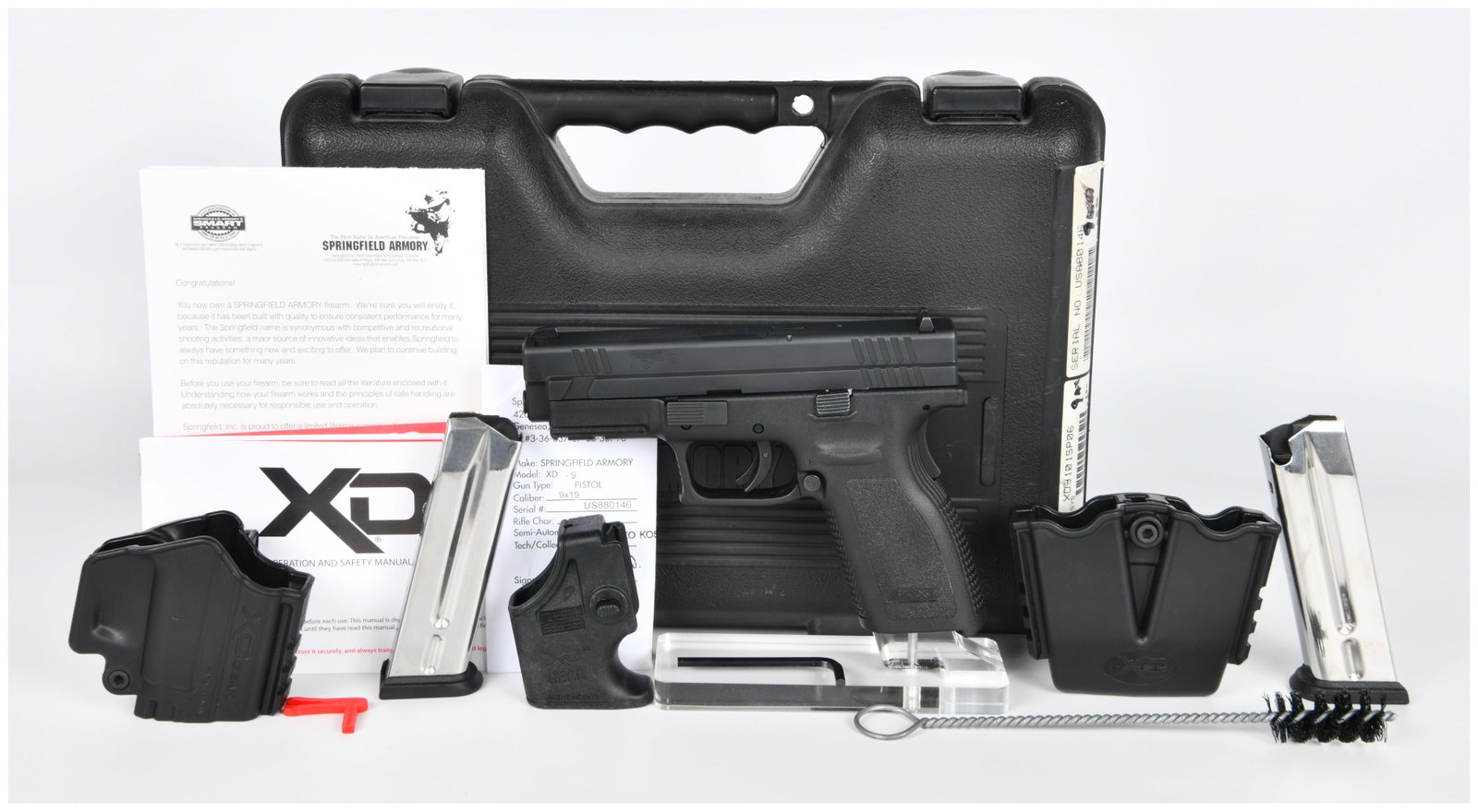 Springfield Armory XD9 Service Semi-Automatic Pistol, 9x19mm: A Springfield Armory XD9 Service semi-automatic pistol, chambered in 9x19mm. The pistol features a matte black finish with a polymer frame and a metal slide. Visible markings include XD-9, SPRINGFIELD