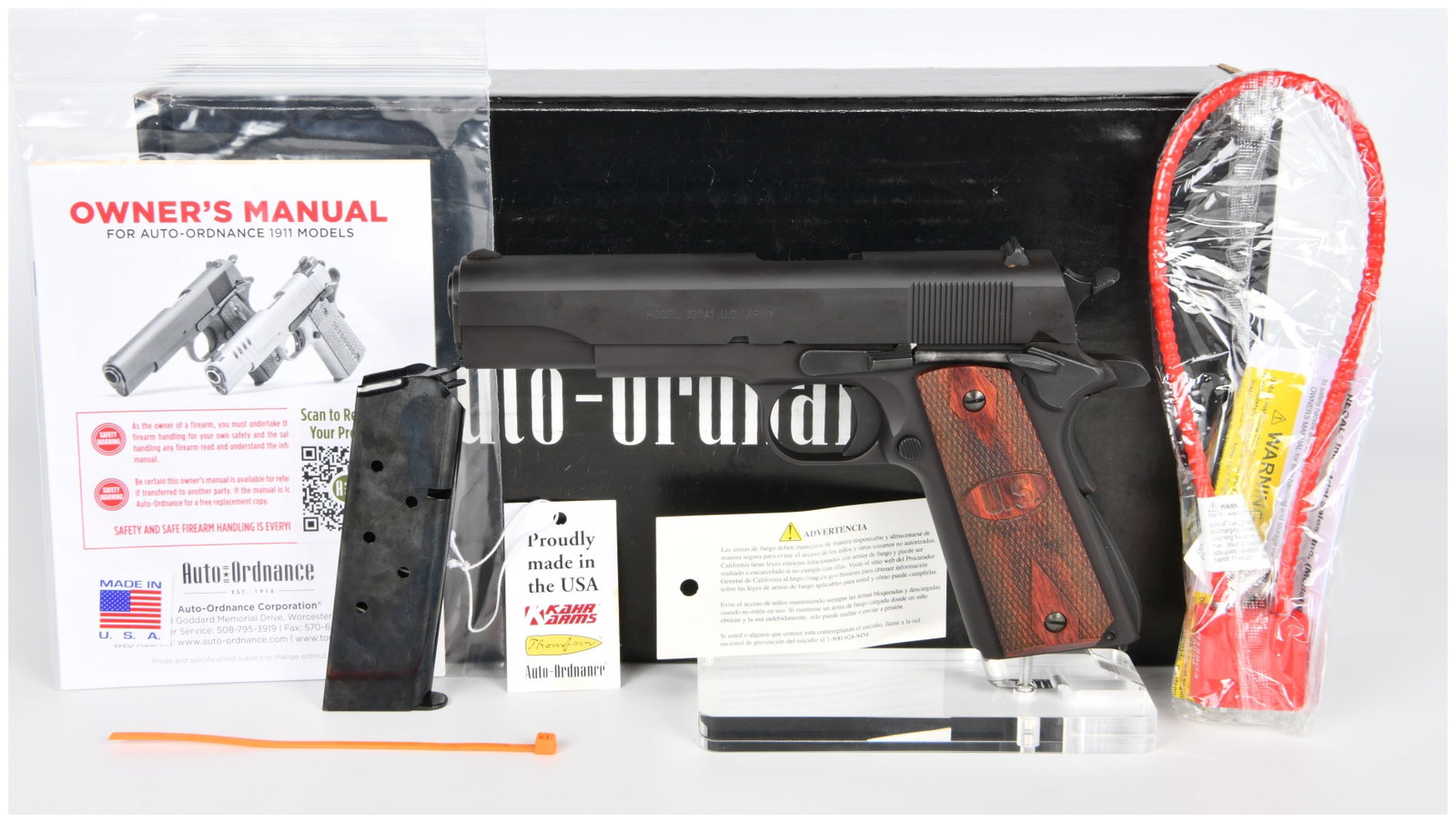 Auto-Ordnance Model 1911A1 U.S. Army .45 ACP Semi-Automatic Pistol: A modern production Auto-Ordnance Model 1911A1 U.S. Army semi-automatic pistol, chambered in .45 ACP. The pistol features a blued steel finish and checkered wood grip panels embossed with U.S.. Visibl