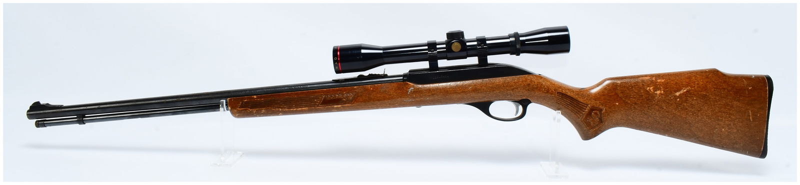 Marlin Glenfield Model 60 .22 LR Semi-Automatic Rifle with Simmons Scope: A Marlin Glenfield Model 60 semi-automatic rimfire rifle, manufactured by The Marlin Firearms Co. of North Haven, Connecticut, U.S.A., and chambered for .22 Long Rifle ammunition. The rifle features a