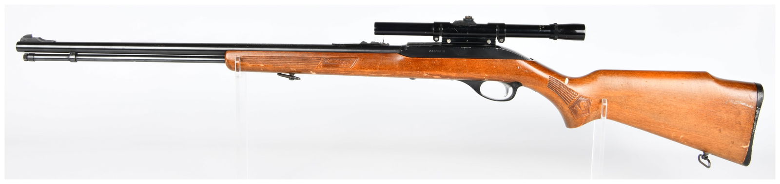 Marlin Glenfield Model 60 .22 LR Semi-Automatic Rifle with Bushnell Scope: A Marlin Glenfield Model 60 .22 LR semi-automatic rifle, manufactured by The Marlin Firearms Co., North Haven, Conn. U.S.A. This rifle features a varnished light-brown wooden stock with impressed chec