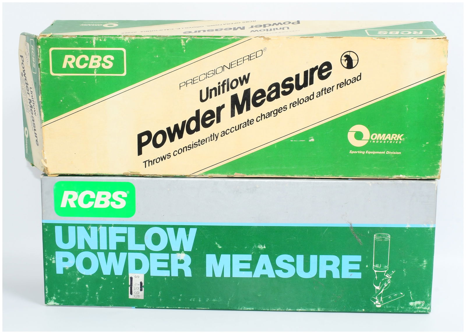 RCBS Uniflow Powder Measure in Original Packaging: An RCBS Uniflow Powder Measure, likely dating from the mid-to-late 20th century, contained within its original two-part cardboard packaging. The device features a green hammer-tone painted cast metal