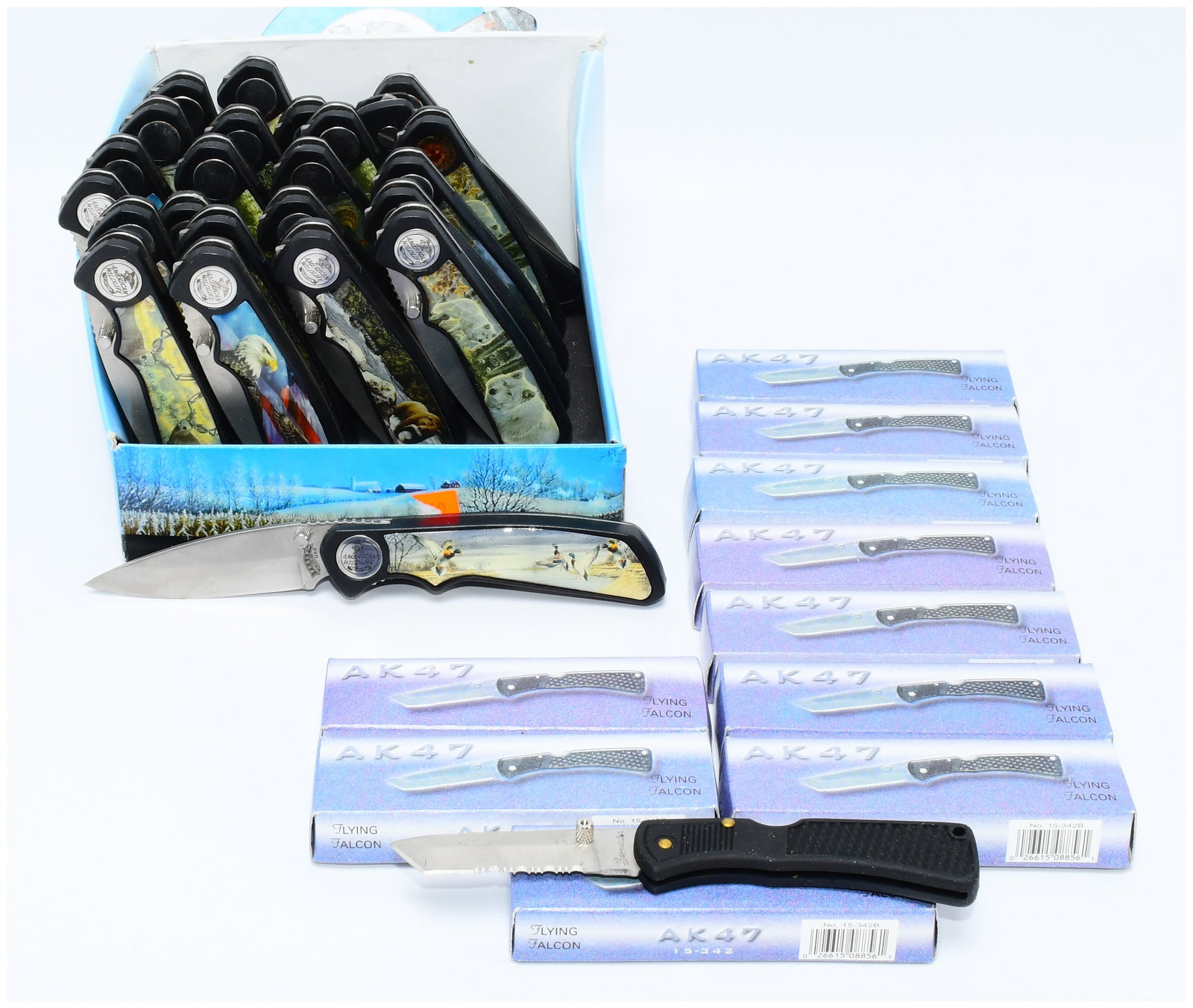 A Group of Contemporary AK47 and Flying Falcon Folding Knives: A group of approximately 30 new, contemporary folding knives, branded 'AK47' and 'FLYING FALCON'. Approximately 20 of these are presented in a cardboard display box, featuring stainless steel blades a