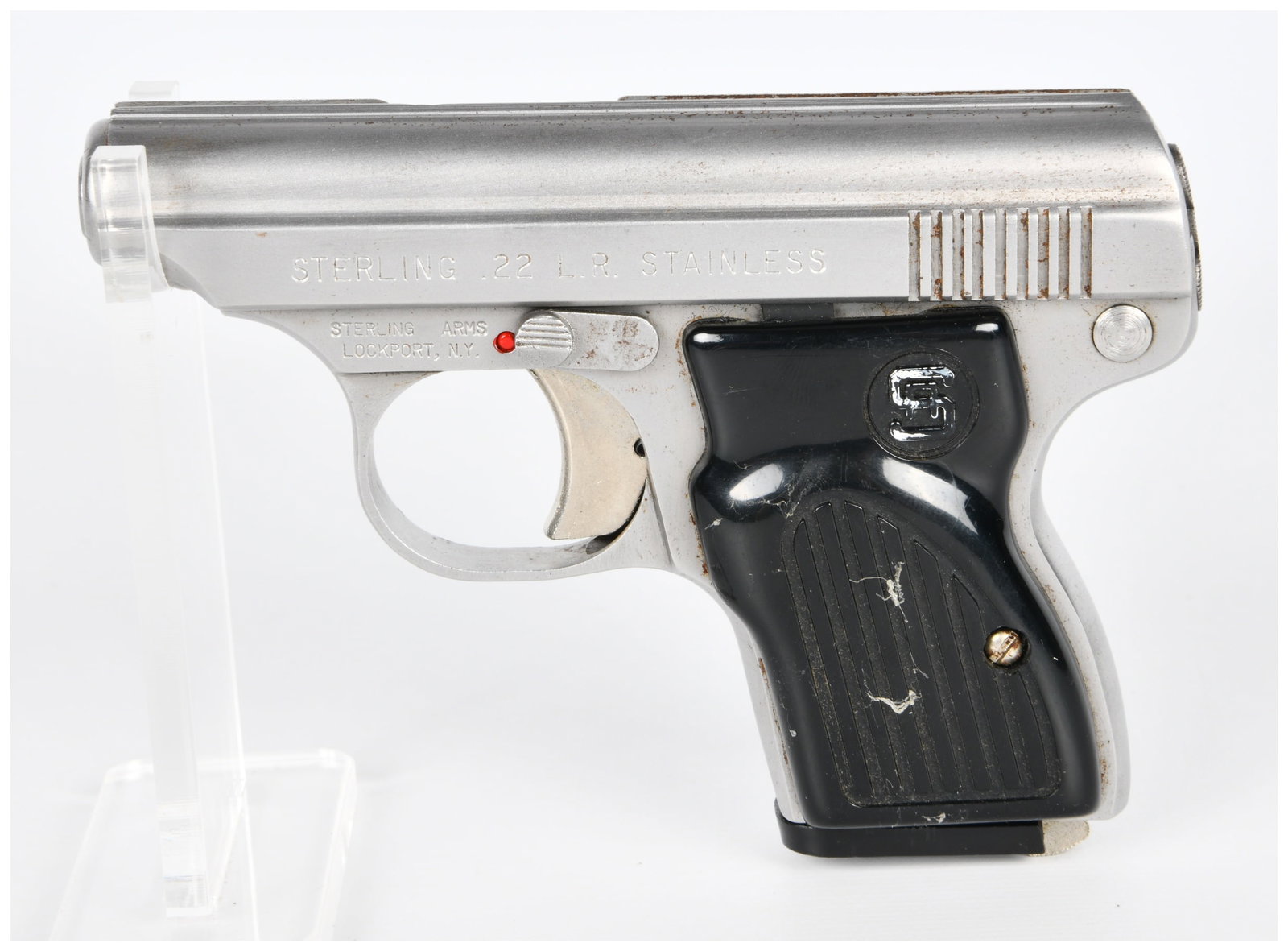 Sterling Arms Model 302 .22 LR Stainless Semi-Automatic Pistol: A Sterling Arms Model 302 .22 LR Stainless Semi-Automatic Pistol. This compact, semi-automatic pistol is primarily constructed of stainless steel with black polymer grips. The slide is marked STERLING