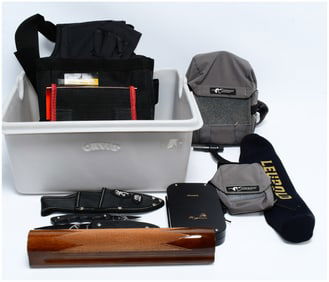 A Collection of Veto Pro Pac, Stone Glacier, and Other Outdoor Sporting Goods