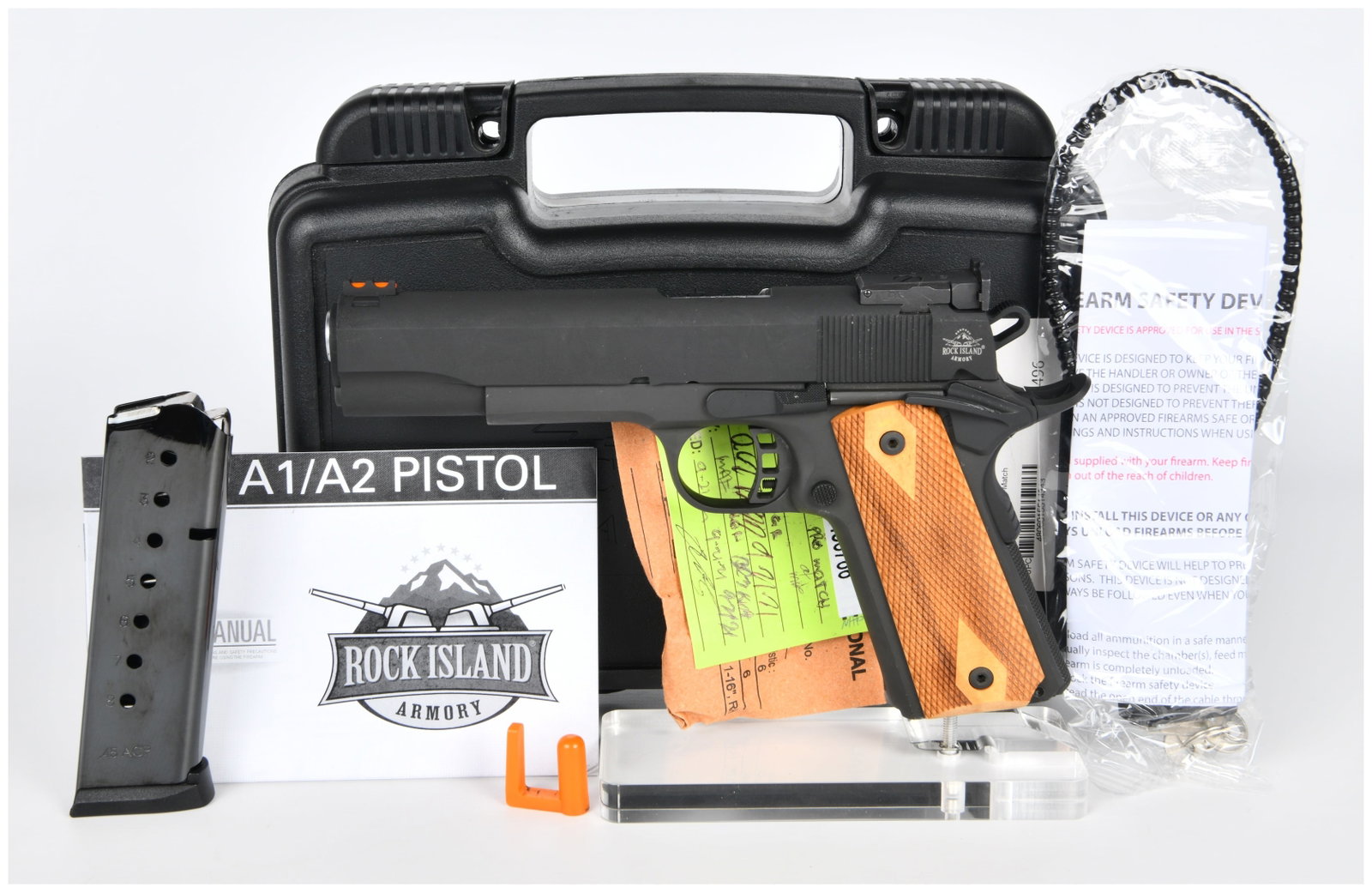 Rock Island Armory M1911 A1 FS Match .45 ACP Semi-Automatic Pistol: This Rock Island Armory M1911 A1 FS Match semi-automatic pistol, chambered in .45 ACP, features a matte black finish on its metal frame and slide, with contrasting checkered light-colored wooden grip 