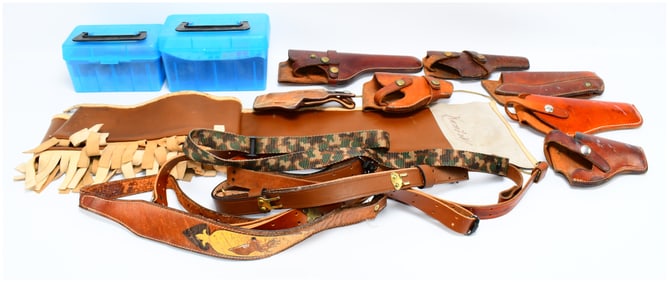 A Collection of Leather Holsters, Belts, and Firearm Accessories
