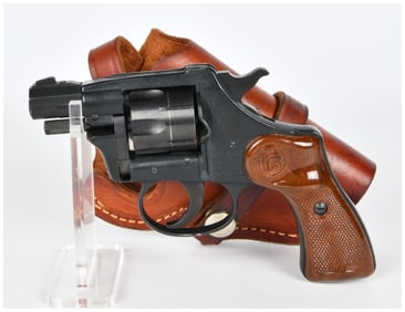A Rohm RG 23 .22LR Double-Action Revolver with Leather Holster